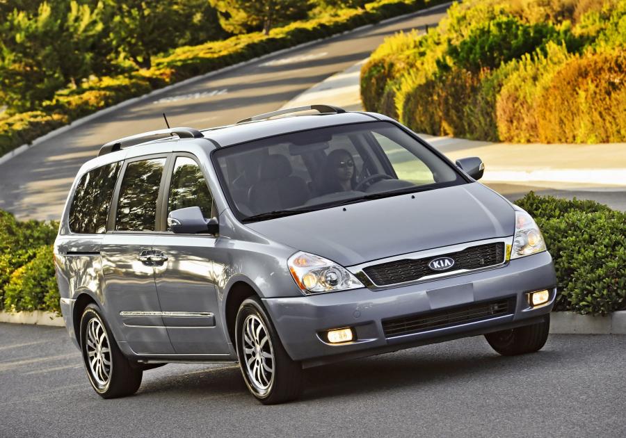  Kia Sedona 2010 года  (фото 42 из 54)